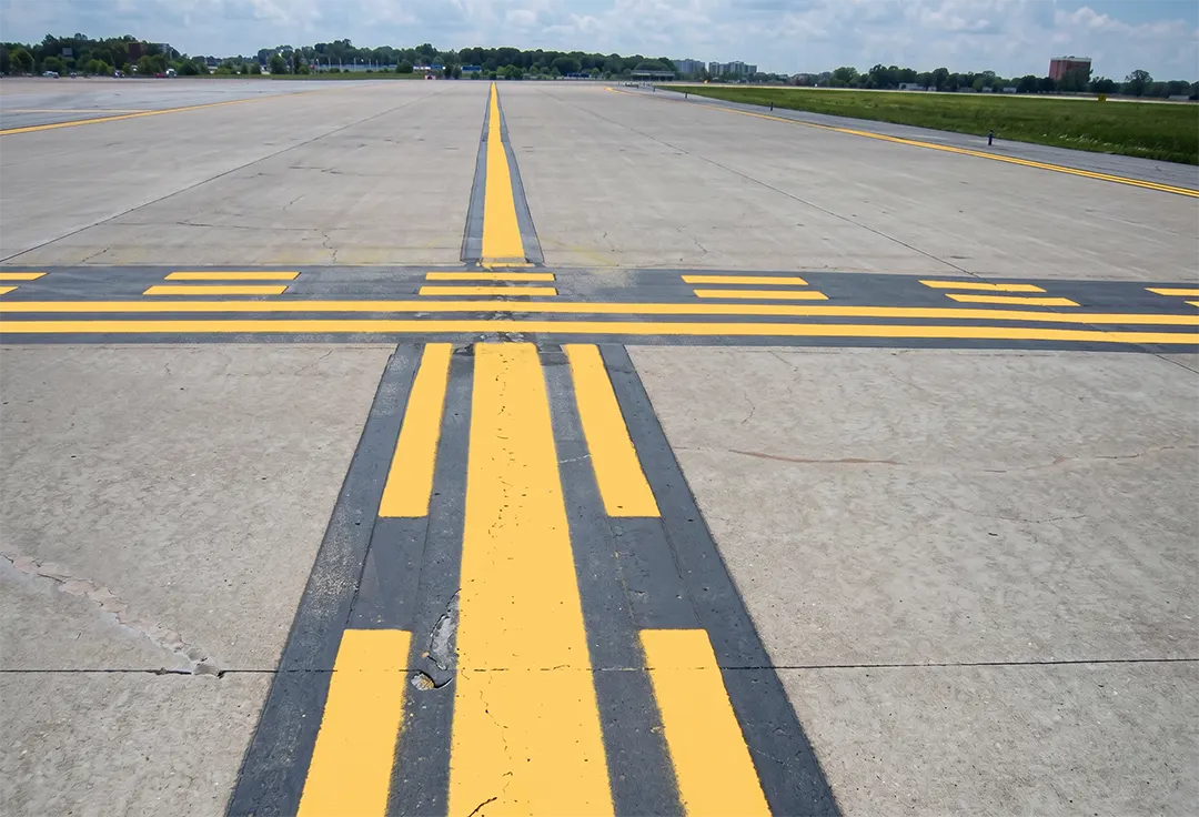 Surface painted holding position marking along with enhanced taxiway centerline