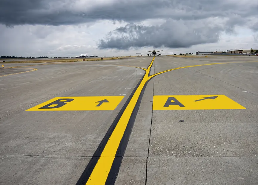 Surface painted taxiway direction signs